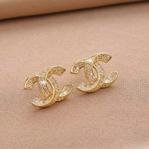 Chanel Stud Earrings  (Gold)