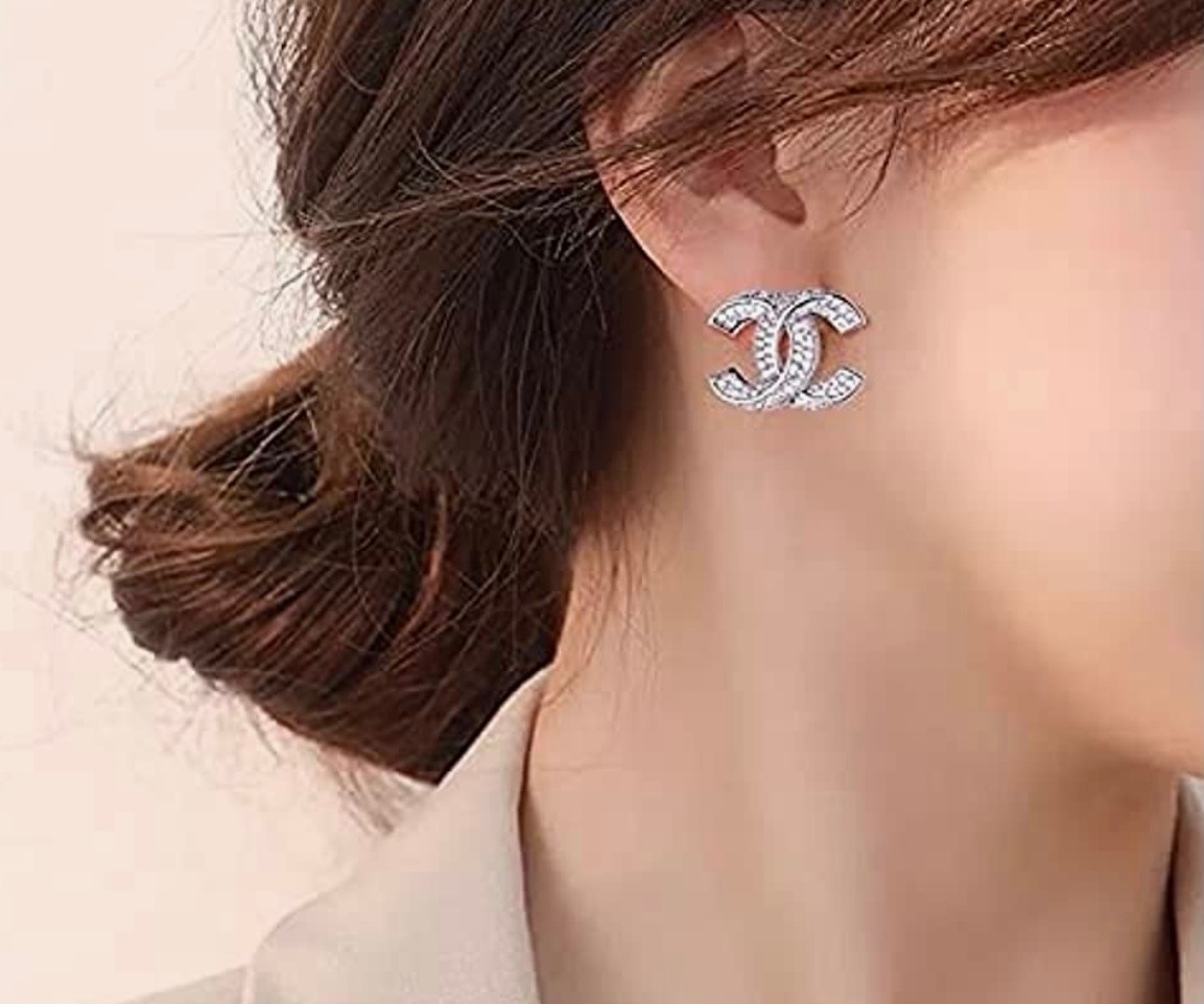 The Two Chanel Earrings Look So Chic I Love The Double Piercing Chanel Stud  Earrings, Chanel Earrings, Chanel Sign 